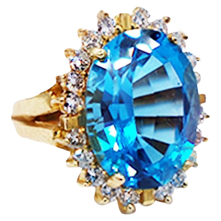 London Blue Topaz and 1 Carat Diamond Halo Ring 18 Karat Yellow Gold