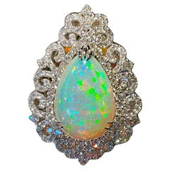 Spectacular 20 Carat Pear Shaped Opal and Diamond 18 Karat Gold Cocktail Ring