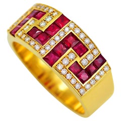 Anello Dimos a fascia con chiave greca in oro 18k e rubini