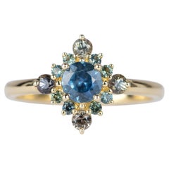 Blue Montana Sapphire with Unique Teal Sapphire Halo 14K Gold Engagement Ring