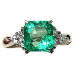 2.68 Carat Colombian Emerald and Diamond Three Stone Engagement Ring