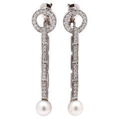 Boucles d'oreilles or blanc diamant perle Cartier Agrafe