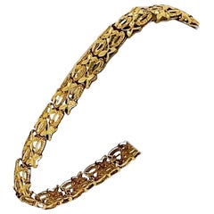 14 Karat Yellow Gold Ladies Sparkling Diamond Cut XO Link Bracelet
