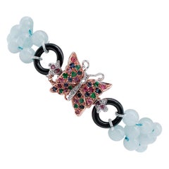 Retro Aquamarine Diamonds Emeralds Rubies Sapphires Onyx 9Kt Gold and Silver Bracelet