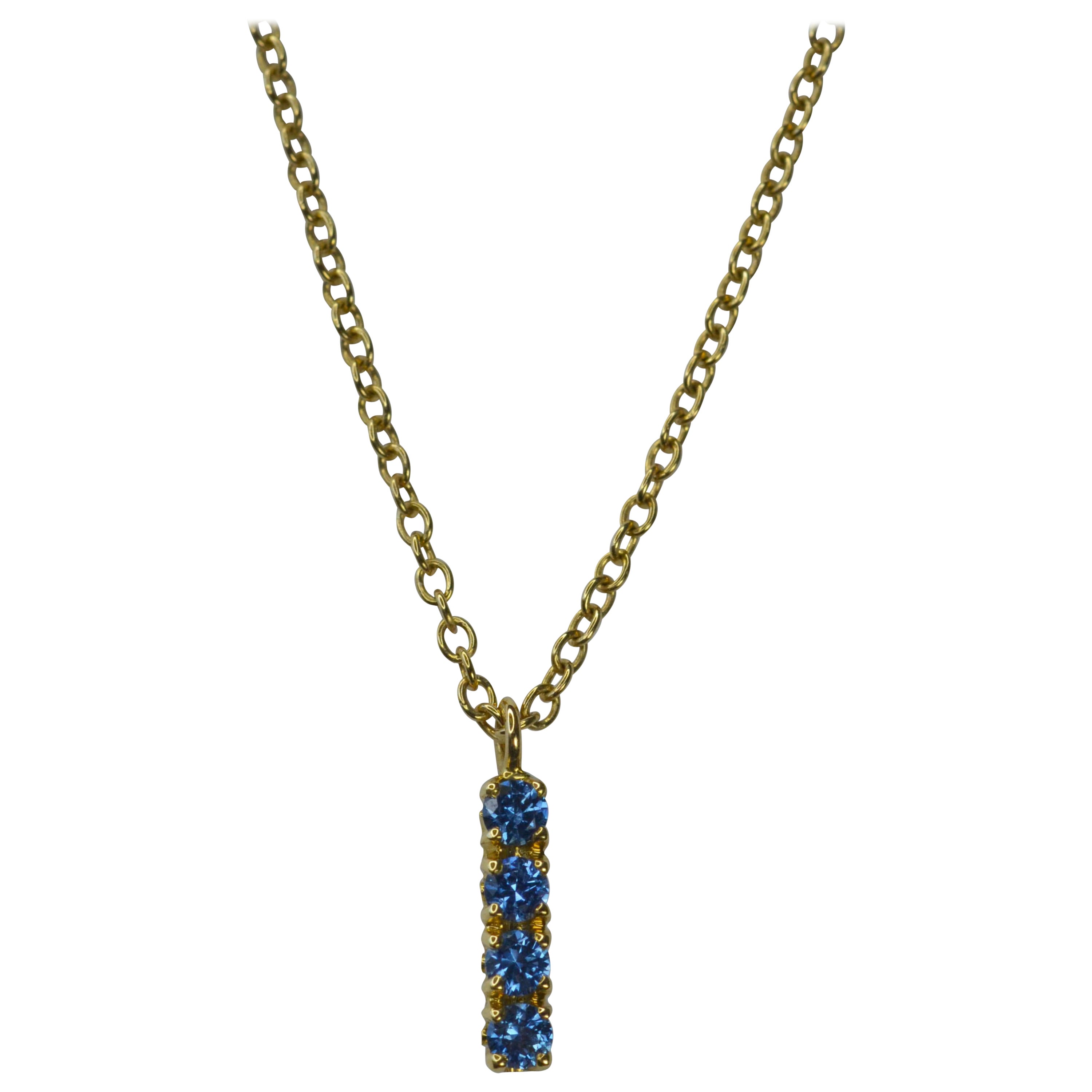 Blue Sapphire Pendant in 18 Karat Yellow Gold