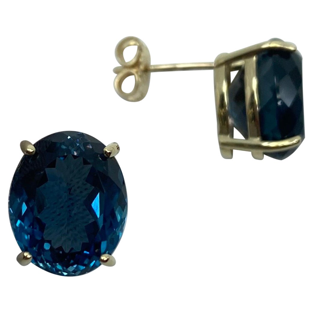 Large 17.53ct Fine London Blue Topaz Oval Cut Yellow Gold Earring Studs