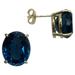 Large 17.53ct Fine London Blue Topaz Oval Cut Yellow Gold Earring Studs