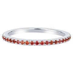 Fascia in oro bianco 14 carati con zaffiro arancione da 0,36 ct.