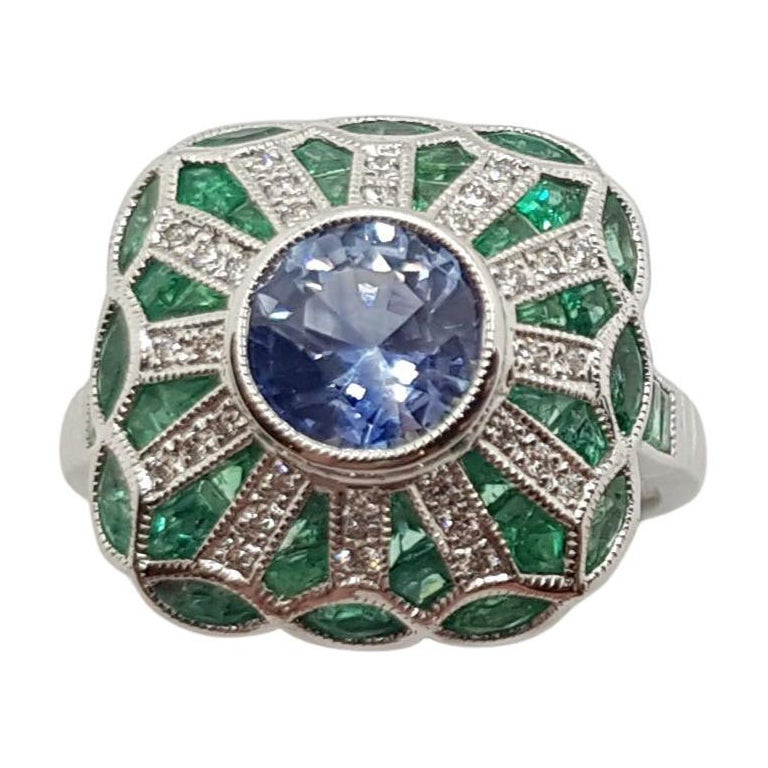 Blue Sapphire with Emerald and Diamond Ring Set in 18 Karat White Gold Settings