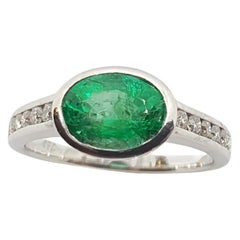 Emerald with Diamond Ring Set in 18 Karat White Gold Settings