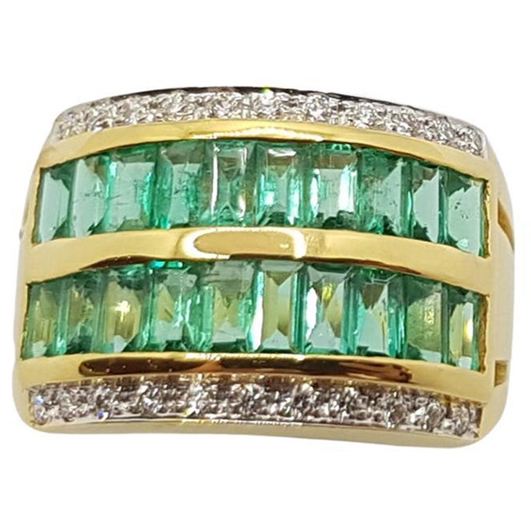 Emerald with Diamond Ring Set in 18 Karat Gold Settings