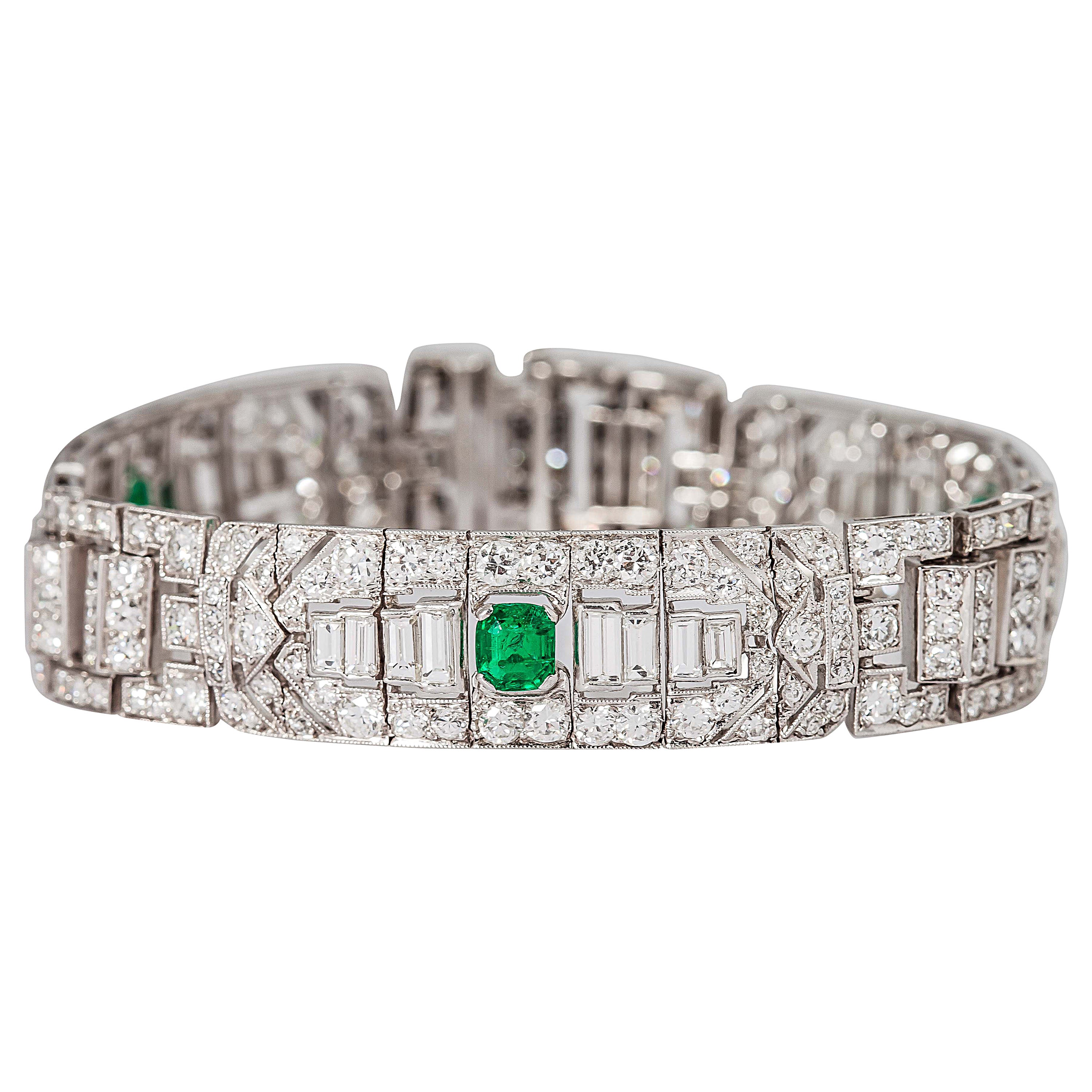 Magnificent Emerald and Diamond Platinum Art Deco Bracelet For Sale at