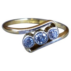 Antique Diamond Three Stone Ring in Cross Over Twist Design, Circa 1930s