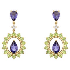 Prong Oval Shape Dangle Earrings in 18kt Gold with Iolite Peridot and Diamonds