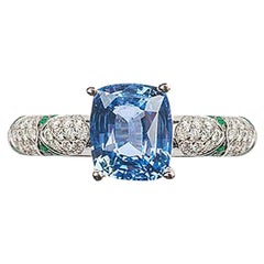 Lotus Ceylon Sapphire Solitaire Center with Emerald Petals and Pave Diamond Ring