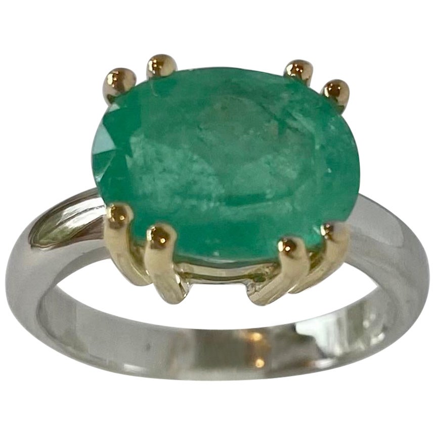 Gold Emerald Estate Engagement Solitaire Ring Big 4.00 Carat Natural Colombian Emerald
Primary Stone: 100% Natural Colombian Emerald
Shape or Cut: Oval Cut 
Approx Emerald Weight: Approx. 4.00 Carats (1 emerald)
Approx Emerald Measurements: 12.00mm