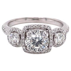 Three Stone Diamond Halo 18 Karat White Gold Engagement Ring