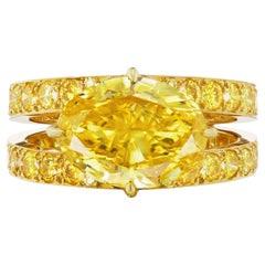 GIA 3.51 Carat Vivid Yellow Oval Diamond 18 Karat Gold Ring