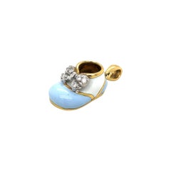 18KT Yellow Gold Baby Shoe Light Blue/White Enamel & 0.12Ct Diamond Bow