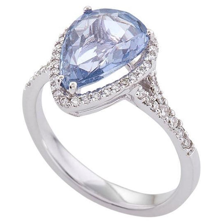 For Sale:  Pear Shape Very Peri Sapphire Ring in 18kt White Gold with Diamonds Halo