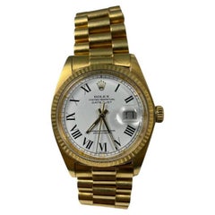 Rolex 1600 Datejust White Dial Roman Numerals 18k Yellow Gold Presidential Band
