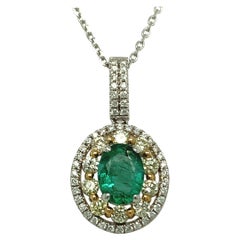 1.24 Carat Emerald Pendant with Yellow and White Diamond Set in Two Tone Gold 