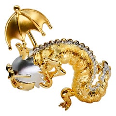 18K Yellow & White Gold, Diamond Dragon with Umbrella & Sunglasses Brooch