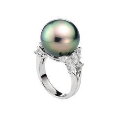 Anello con perle nere e diamanti
