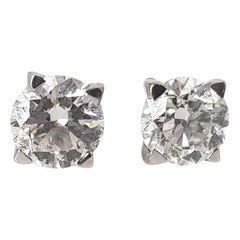 Clous d'oreilles en or blanc 18 carats et diamants