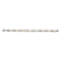 Broche en or blanc 15 carats avec perles anciennes et diamants de 1,01 carat