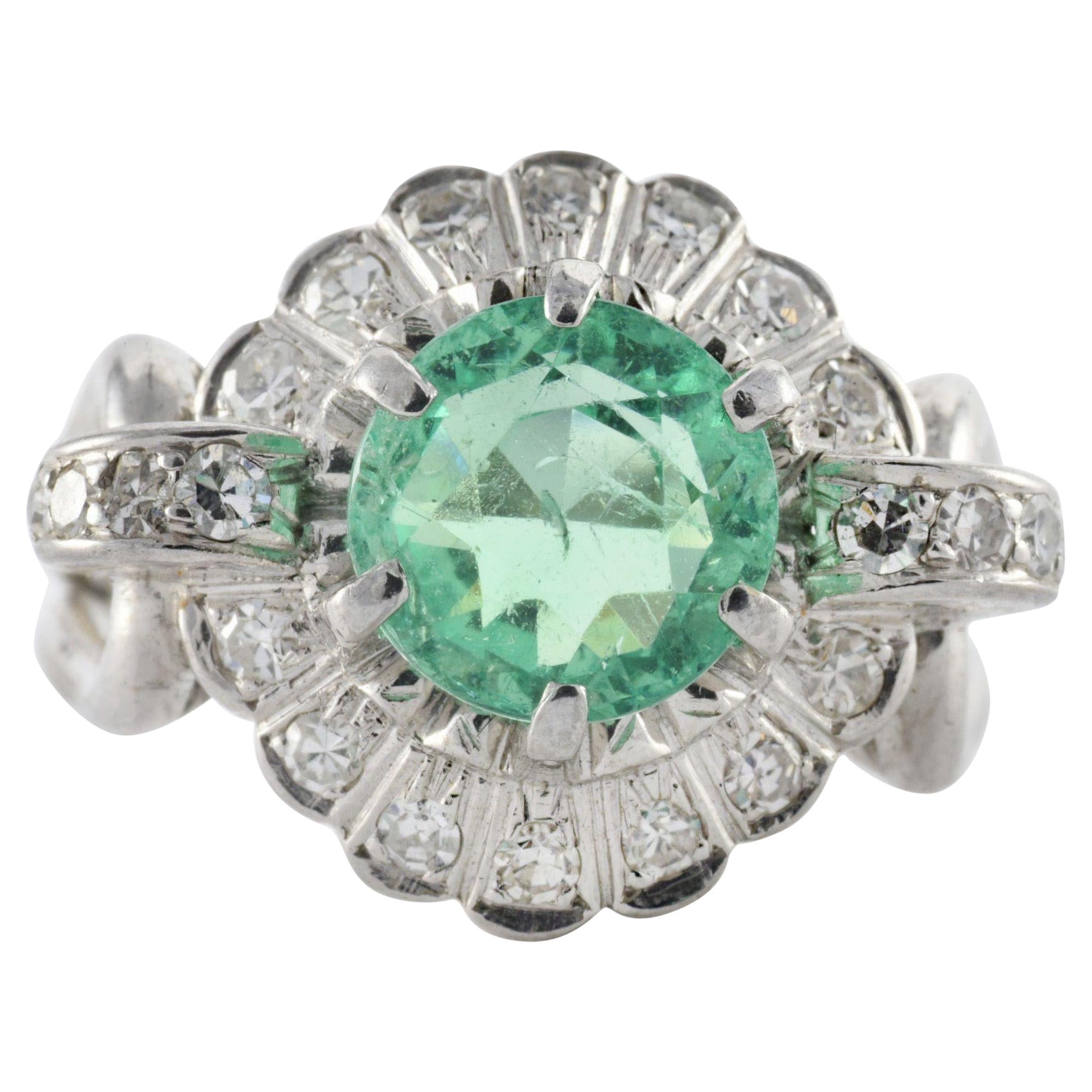 Natural Light Green Emerald and Diamond Halo Ring For Sale