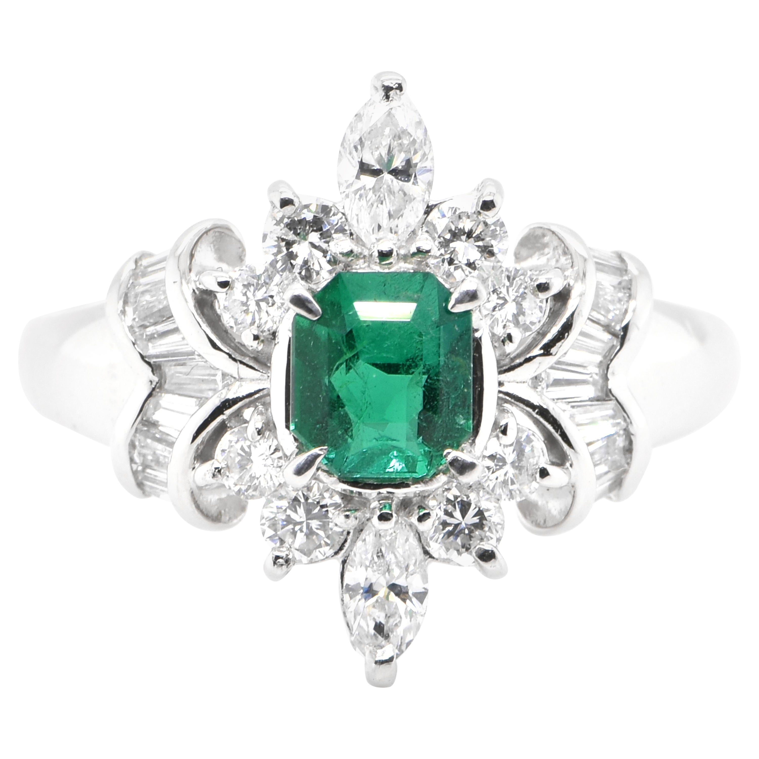 0.52 Carat Natural Emerald and Diamond Ring Set in Platinum