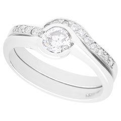 GIA Certified 0.65 carat Diamond and Platinum Engagement Ring and Wedding Band