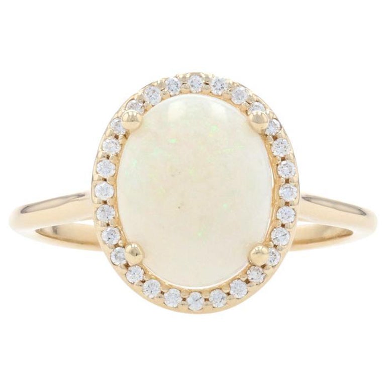 Yellow Gold Opal & Diamond Halo Ring, 14k Oval Cabochon Cut 1.77ctw For Sale