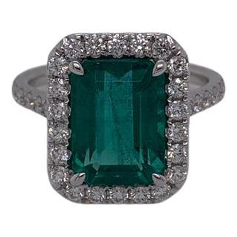 4.35 Carat Emerald Cut Emerald & Diamond Ring in 18 Karat White Gold For Sale