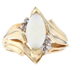 Yellow Gold Opal & Diamond Bypass Ring, 10k Marquise Cabochon Cut .62ctw