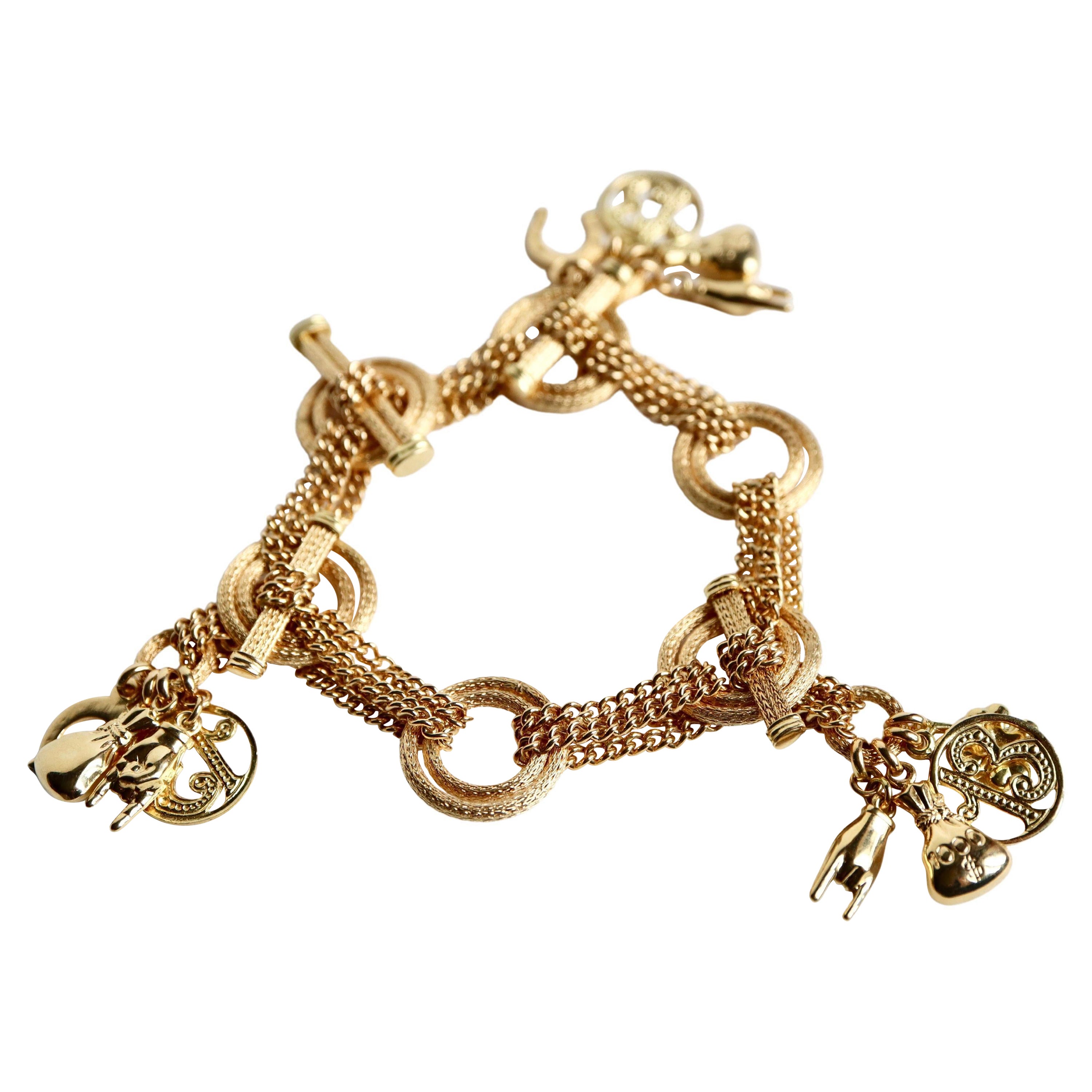 Charm Bracelet in 18k Yellow Gold For Sale