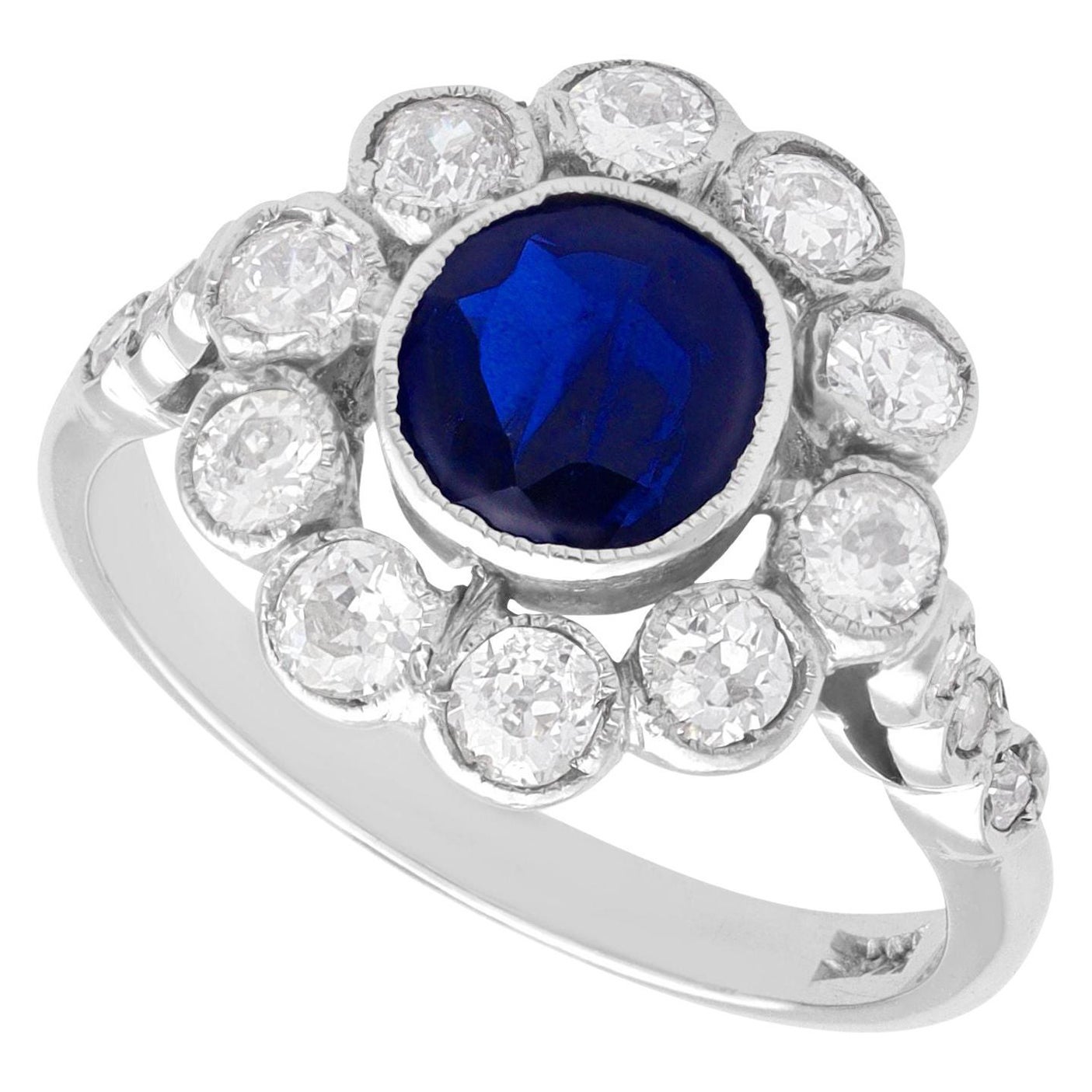 Antique 1.28 Carat Sapphire and 1.20 Carat Diamond White Gold Cluster Ring