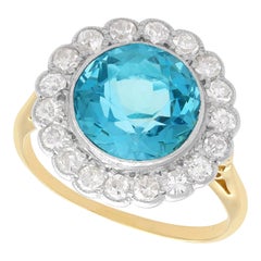 Anillo antiguo de aguamarina de 4,35 quilates y racimo de diamantes de 1,46 quilates