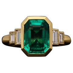 Hancocks Contemporary 2.41ct Emerald-Cut Colombian Emerald Ring Diamond Shoulder