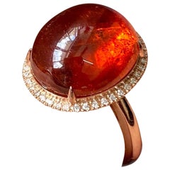 17.75 Carat Oval Cabochon Mandarin Garnet and Diamond Ring