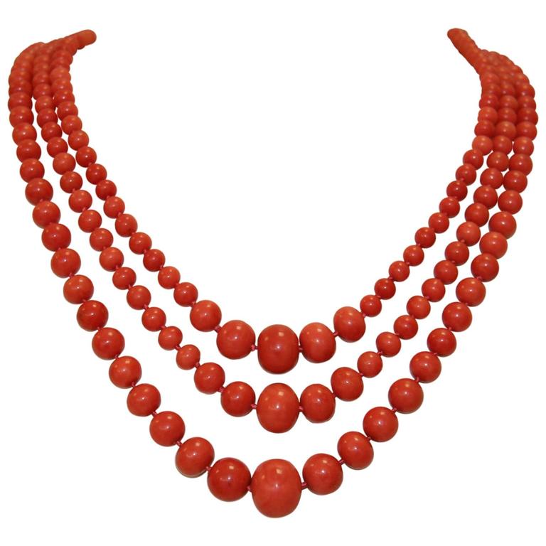 Past Era Sardinian Coral Graduated Triple Strand Necklace For Sale