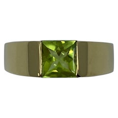 Vintage Cartier Vivid Green Peridot Yellow Gold 18 Karat Tank Band Ring