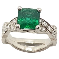 Emerald with Diamond Ring Set in Platinum 950 Settings