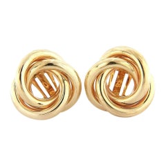 Boucles d'oreilles en or jaune 14 carats avec nœud d'amour poli
