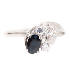 Blue Sapphire and Round Diamond Vintage Engagement Ring in 18 Carat White Gold