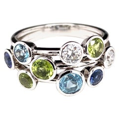 Anello vintage con multigem e diamanti incastonati in oro bianco 18 carati