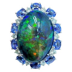 9, 929 18KT Gold Gorgeous 23CT Black Opal Blue Sapphire and Diamond Ring