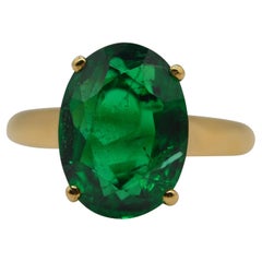 Vintage Cartier Zambian Ring 4.99 Carats Oval Emerald Insignificant GRS Certified Unworn