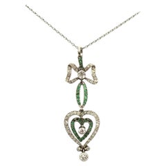 Art Nouveau Emerald Diamond Platinum and Gold Heart Pendant, circa 1915